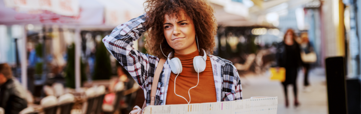 solo travel scratching their head