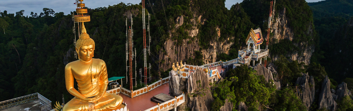 buddist statue on mountain in thailand