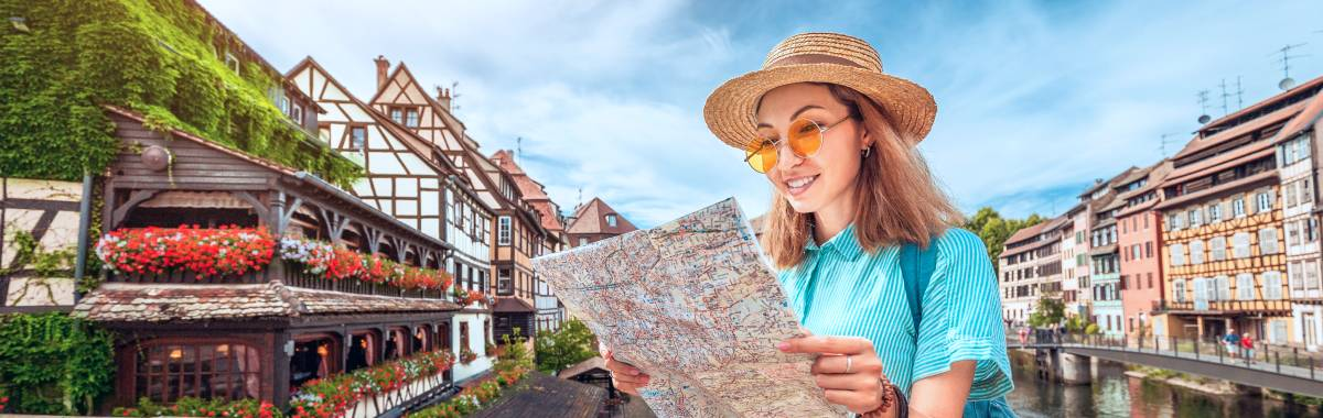 woman with beret looking at the Eiffel Tower in Paris, France