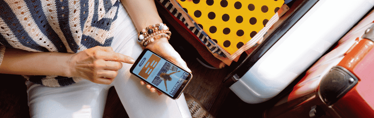 Person on their phone researching something before purchasing