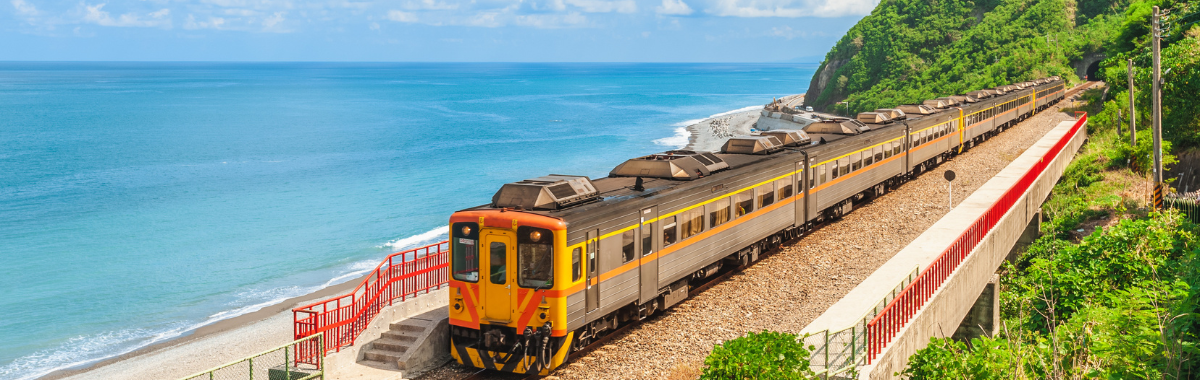 train next to a beach