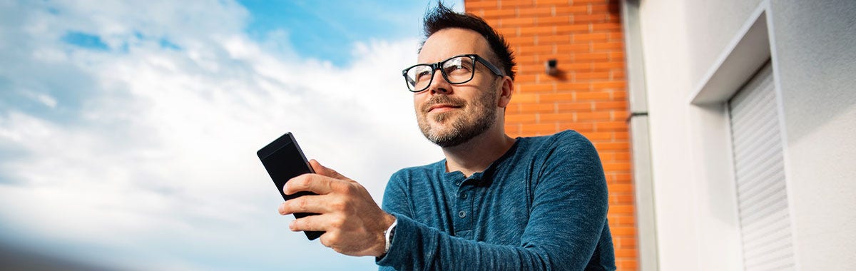 man holding a cell phone