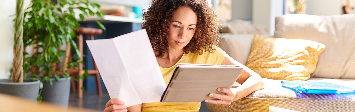 woman reviewing papers
