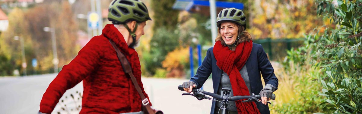 senior couple biking