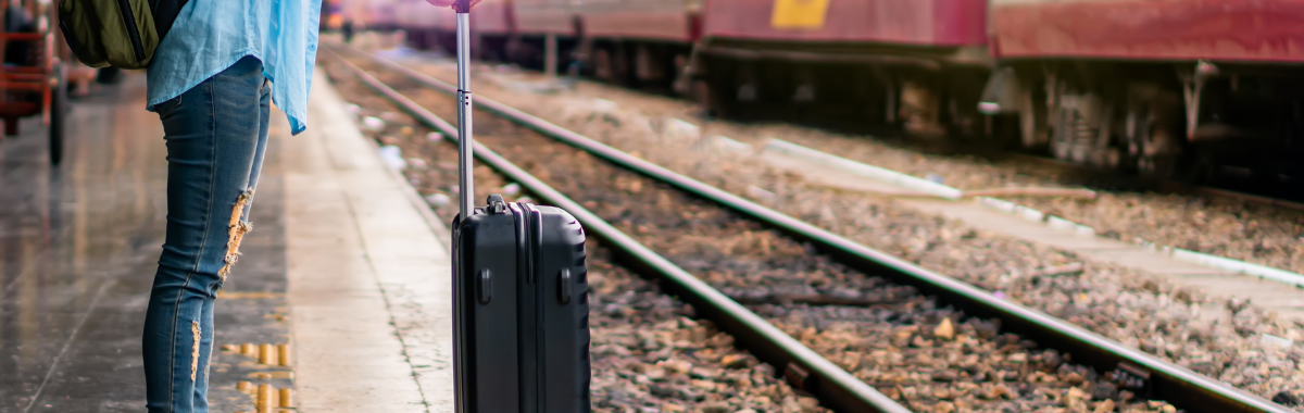 solo traveler waiting for a train