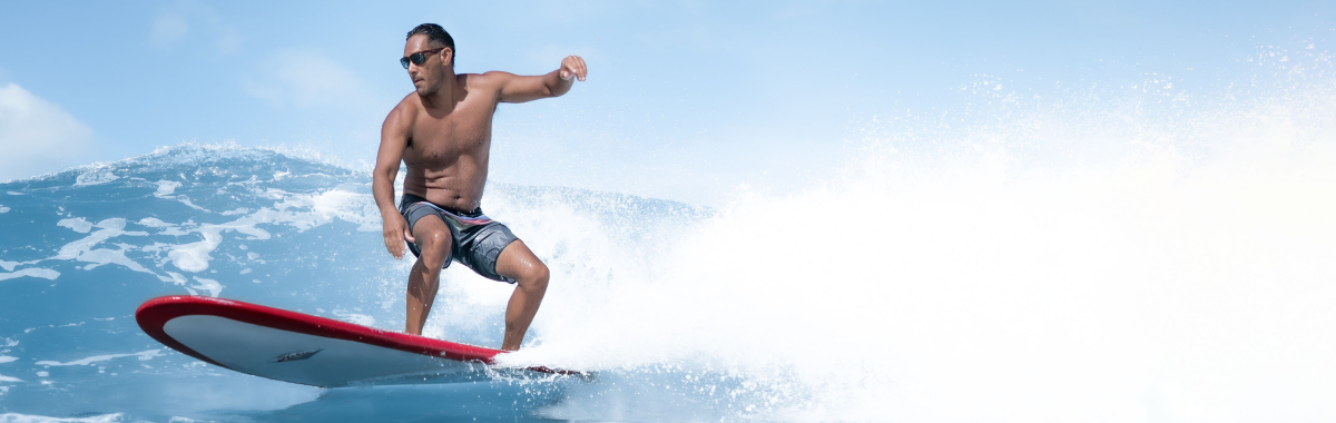 man surfing waves