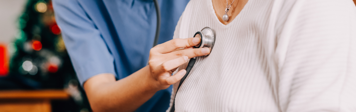 nurse taking heartbeat of patient