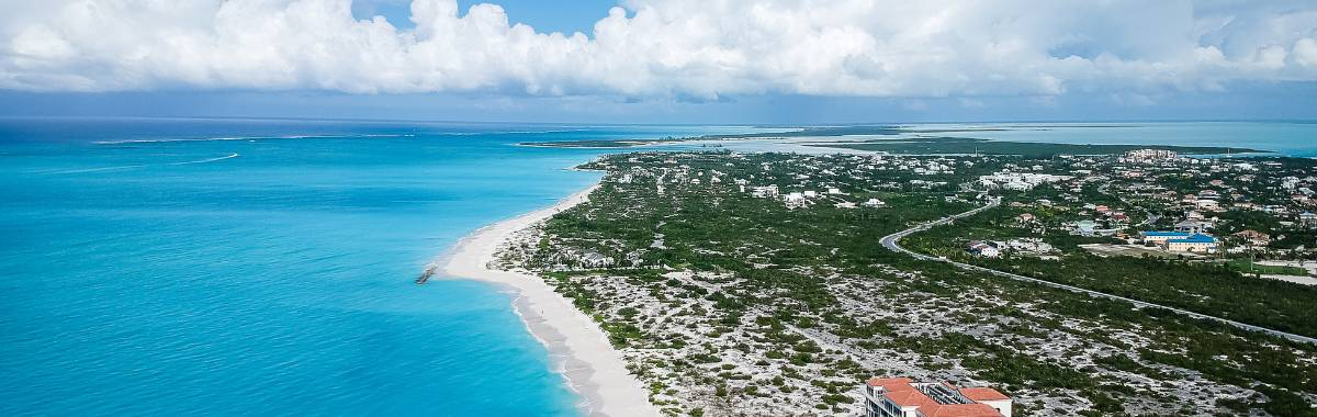 woman with beret looking at the Eiffel Tower in Paris, France
