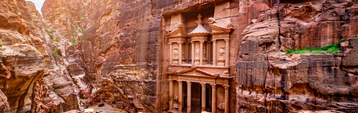 carved structure in side of mountain