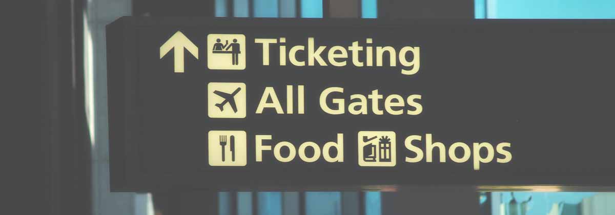 airport sign for food and shops