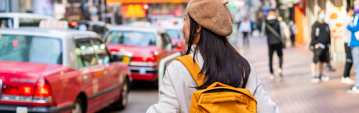 traveler walking through Hong Kong