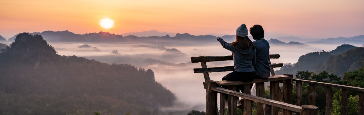 couple looking out at mountains together