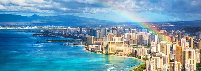 rainbow over skyline in Hawaii