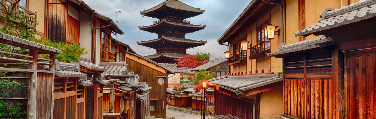 Japanese street with a pagoda at the end of it
