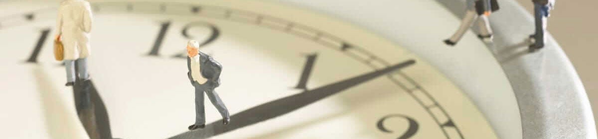 clock with figures walking on it