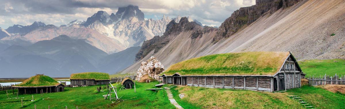 Viking home village with grass growing over roof