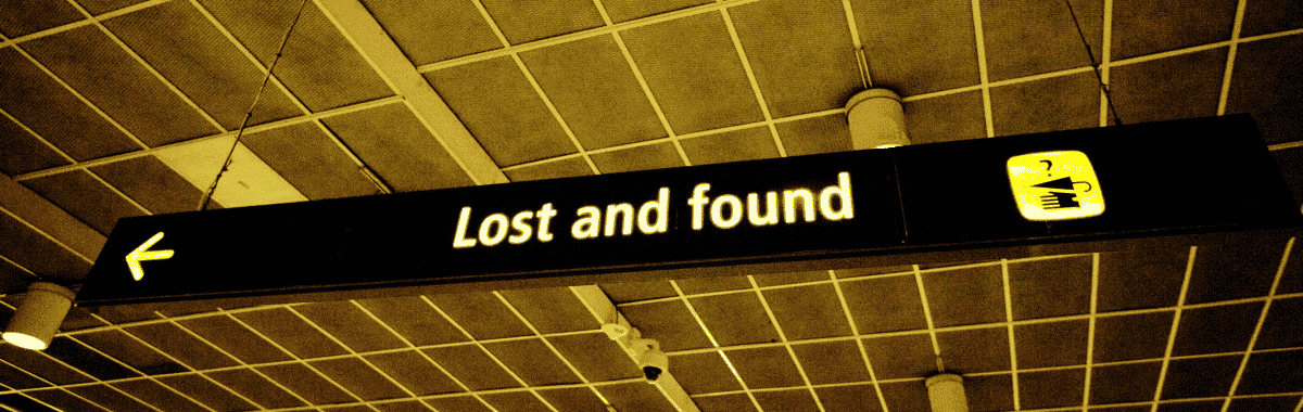 a person helping out another hiker on the mountain