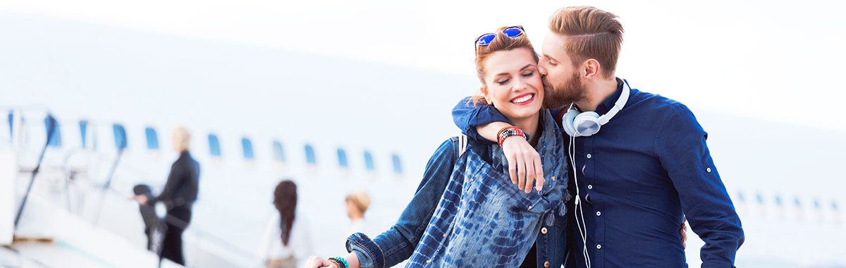 Happy couple embracing over the joy of receiving a gift