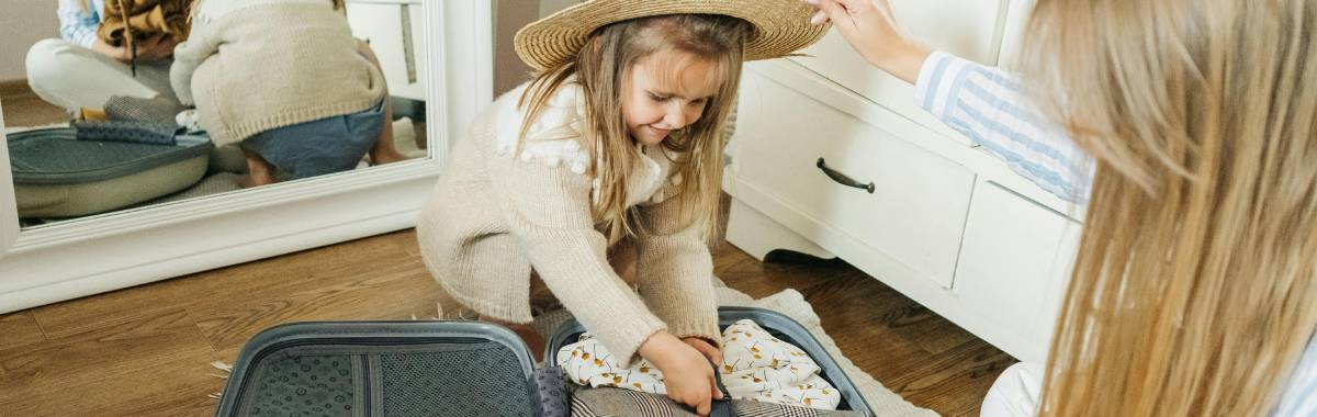 mother and daughter packing