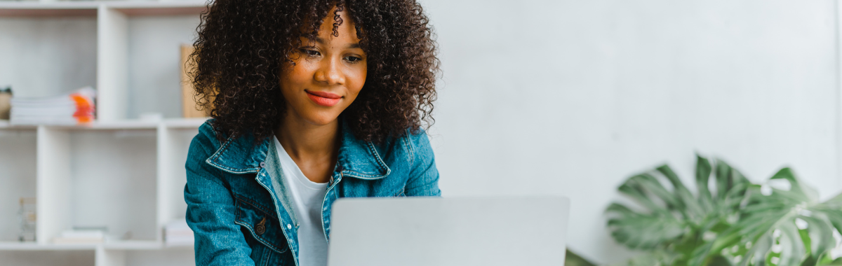 woman looking at laptop