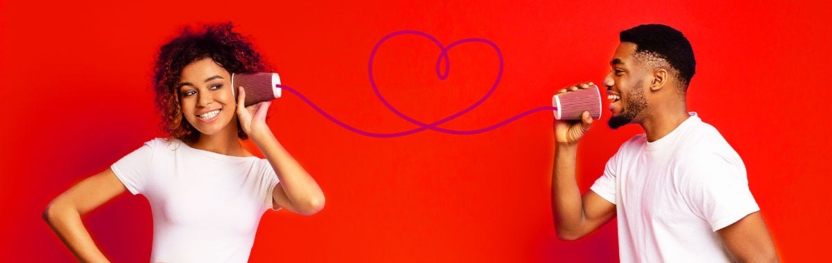 a couple talking through tin cans