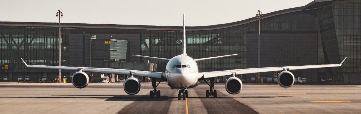 plane on tarmac facing the camera