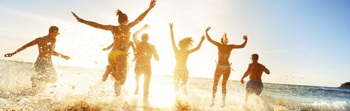 person celebrating with a credit card in hand