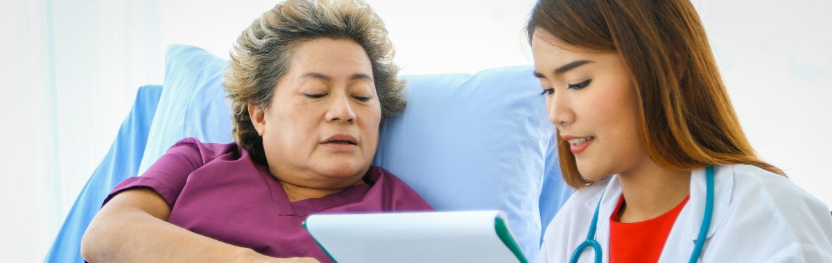 elderly woman with a doctor