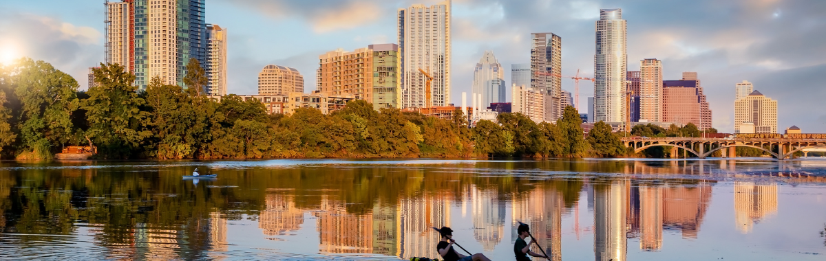 shot of austin texas river as well as the city 
