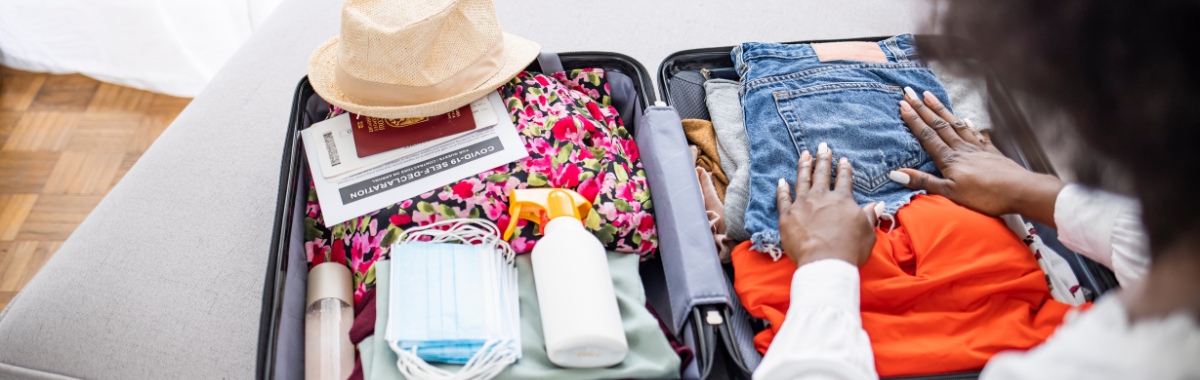 woman packing her bag for a trip