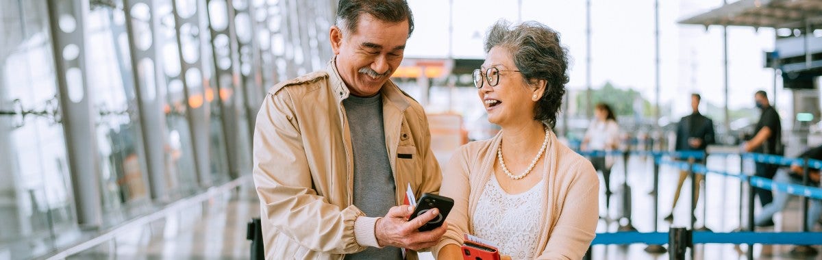 happy couple in the airport 