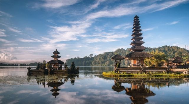 woman with beret looking at the Eiffel Tower in Paris, France