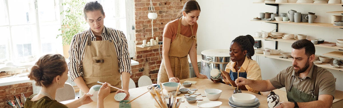 man on laptop at the beach