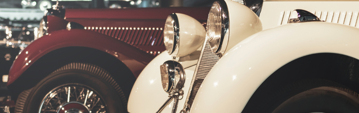 antique cars in a museum