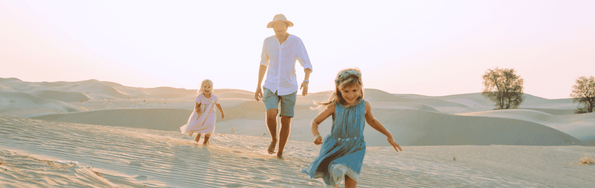 family walking together in the desert