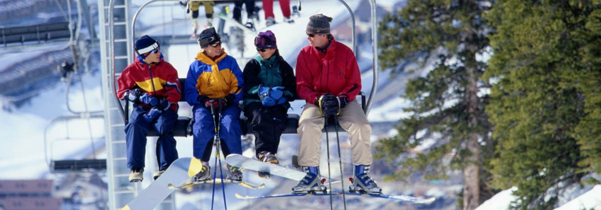 family on a ski lift