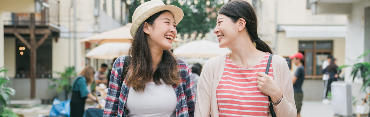 travelers walking together an laughing
