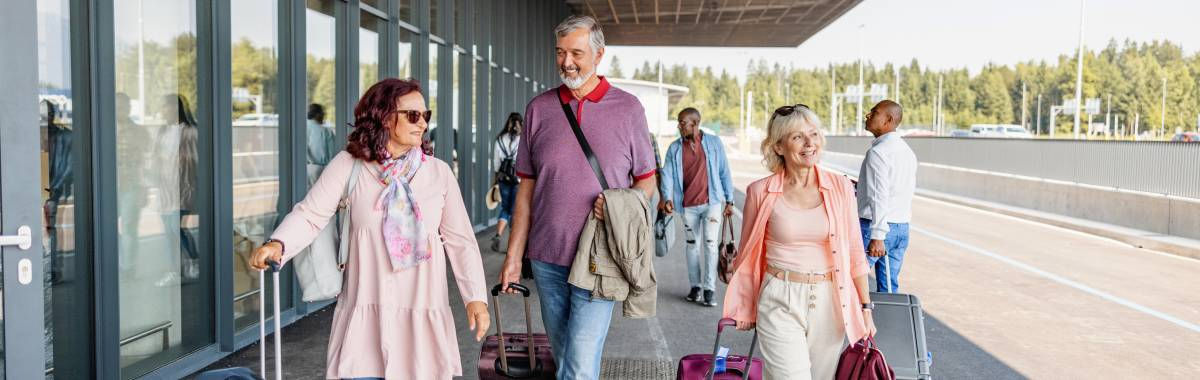 family walking outside an airport