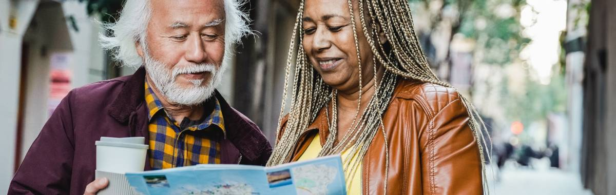 senior couple looking at a map