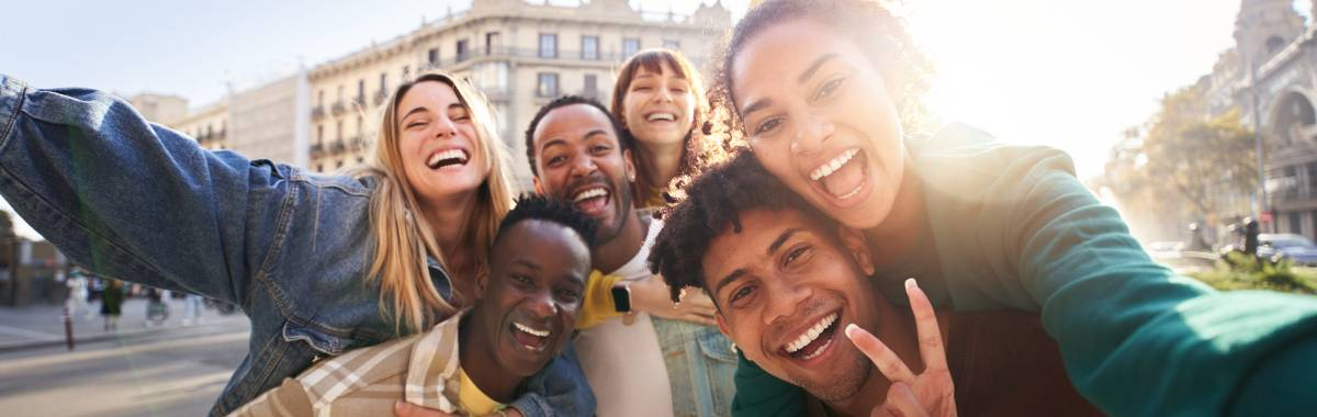 students taking selfie together