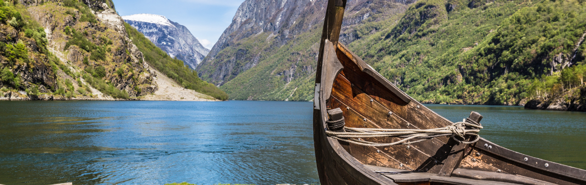 viking boat sitting on beach 