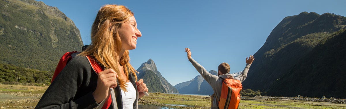 woman with beret looking at the Eiffel Tower in Paris, France
