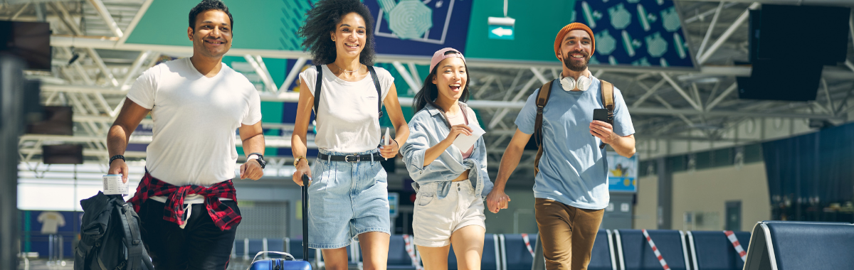 friend running through airport smiling