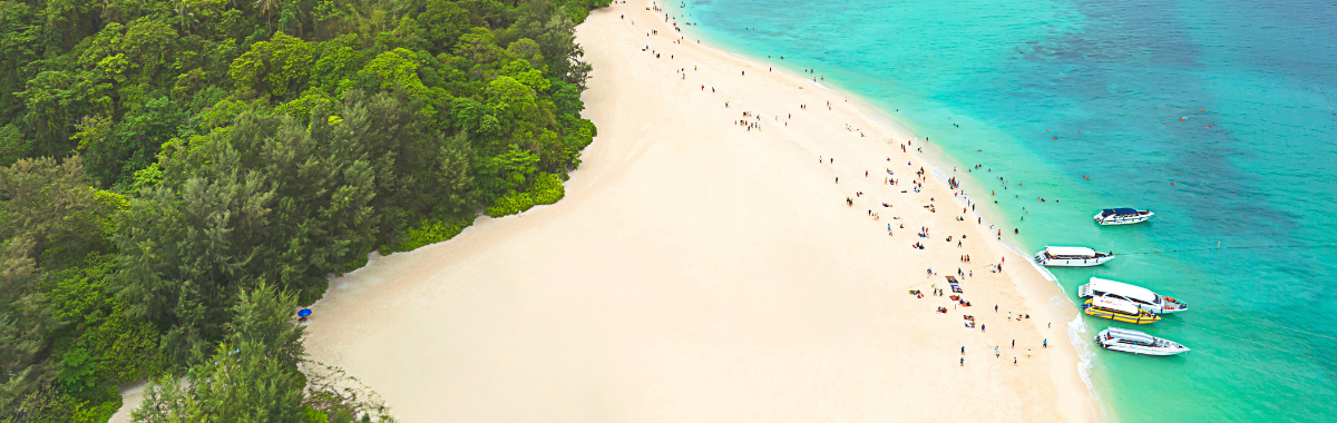 travelers enjoying the cayman island beaches