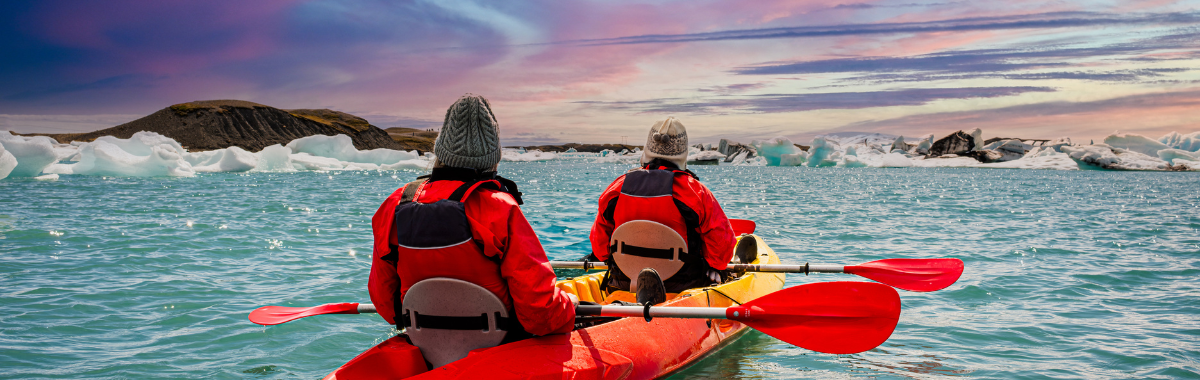 people kayaking in the arctic