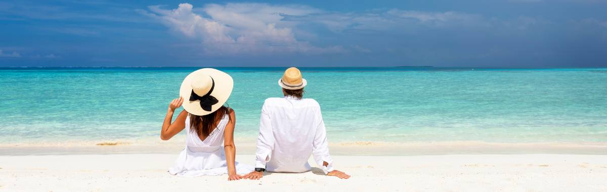 woman with beret looking at the Eiffel Tower in Paris, France