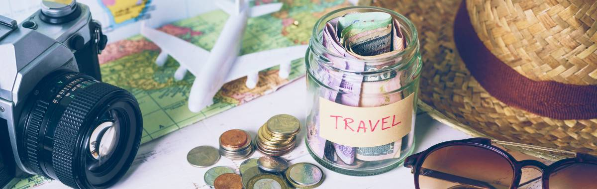 woman embracing the outdoors by putting her arm out the car window