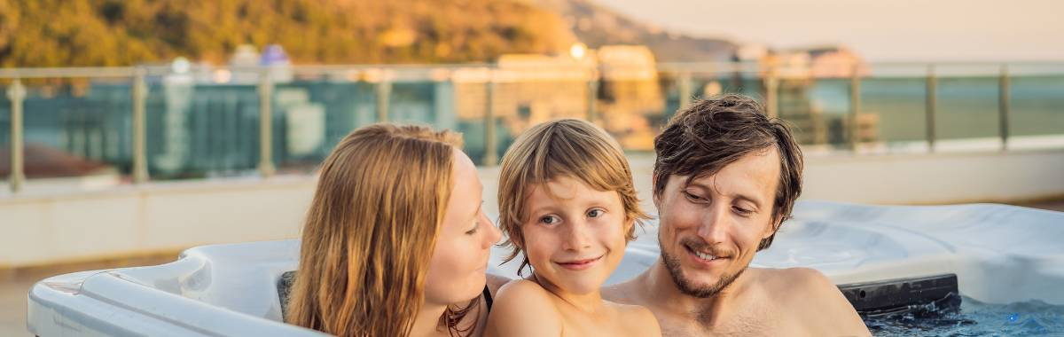 family hanging out in a hot tub