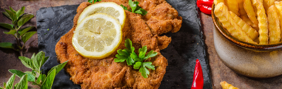 Schnitzel with lemon and fries