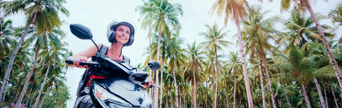 woman driving scooter